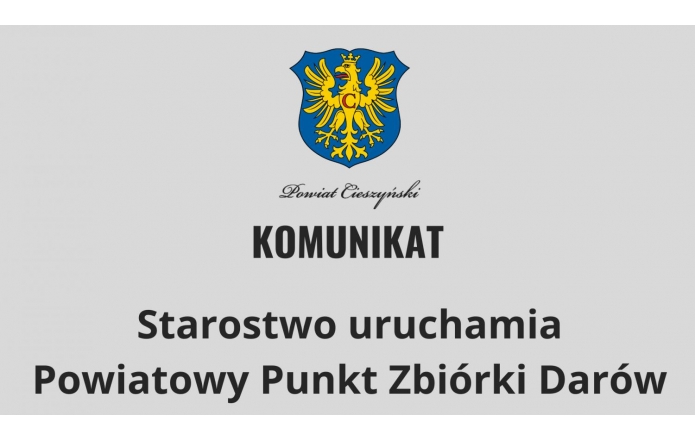  Herb Powiatu Cieszyńskiego oraz napis: "Komunikat. Starostwo uruchamia Powiatowy Punkt Zbiórki Darów." na szarym tle, informacja o pomocy dla potrzebujących.